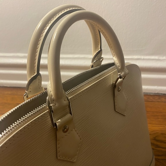 Louis Vuitton
Alma Handbag white Epi Leather PM - Picture 7 of 16